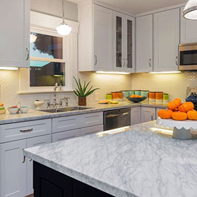 White marble kitchen with bright lighting